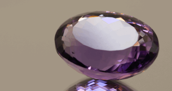 Natural oval cut amethyst gemstone with purple violet color, 21.80 × 16.00 mm