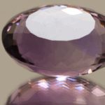Natural oval cut amethyst gemstone with purple violet color, 22.90 × 17.70 mm