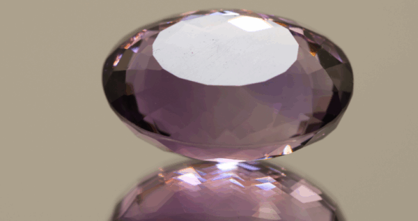 Natural oval cut amethyst gemstone with purple violet color, 22.90 × 17.70 mm