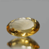 Natural oval cut citrine gemstone with yellow-orange color, 17.10 × 13.30 mm