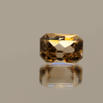 Light brown octagon-shaped topaz, 4.17 carat, 10 × 7 × 6.1 mm, no treatment, unknown origin.