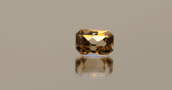 Light brown octagon-shaped topaz, 4.17 carat, 10 × 7 × 6.1 mm, no treatment, unknown origin.