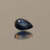 Royal blue pear-shaped sapphire, 0.8 carat, 6.79 × 4.97 × 2.98 mm, heat-treated, Madagascar origin, IGS certified.