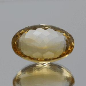 Natural oval cut citrine gemstone with yellow-orange color, 18.30 × 12.80 mm