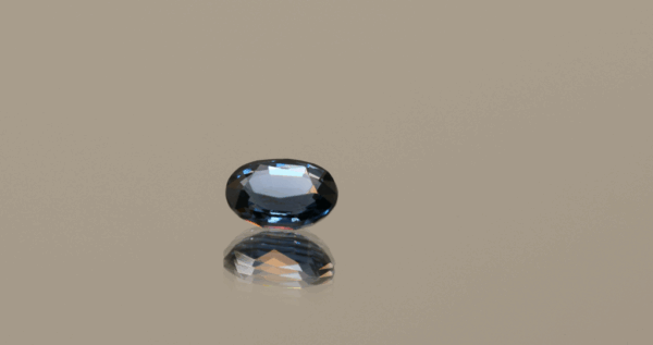 Oval-shaped Intense blue spinel gem, 1.08 carat, 7.02 × 5.45 × 3.24 mm, color change, no treatment, unknown origin, ALGT certified.