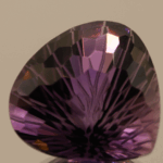 Natural pear cut amethyst gemstone with purple violet color, 18.80 × 18.00 mm