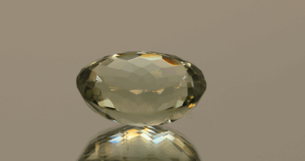 Natural prasiolite gemstone, 14.64 carat, oval cut, pale green color, untreated, loose gemstone, dimensions 18 × 13.5 × 8.9 mm, ideal for fine jewelry.