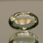 Natural prasiolite gemstone, 14.5 carat, oval cut, pale green color, untreated, loose gemstone, dimensions 18.4 × 13.7 × 8.5 mm, ideal for fine jewelry.