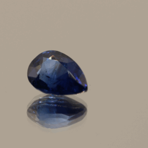 Royal blue sapphire, pear-shaped sapphire, heat treated, Madagascar origin, 1.6 carat, dimensions 8.36 × 6.02 × 4.22 mm, AIG certified.