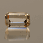 Light brown octagon-shaped topaz, 10.91 carat, 14.2 × 8.8 × 7.6 mm, no treatment, unknown origin.
