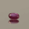 Natural ruby red oval gemstone, 1.72 carat, oval cut, red color, unheated, loose gemstone, dimensions 8.25 × 6.21 × 3.47 mm, origin unknown, AIG certified.