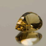 Brownish yellow pear-shaped smoky quartz, 8.52 carat, 17.6 × 11.8 × 8.20 mm, no treatment, unknown origin.