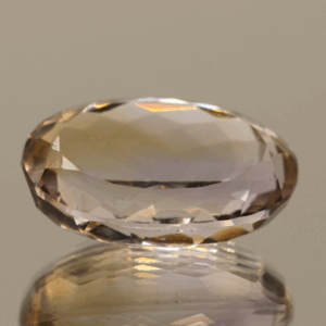 Natural oval cut ametrine gemstone with purple yellow color, 19.30 × 13.70 mm