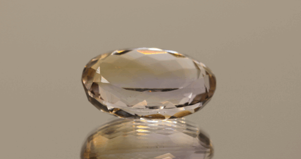 Natural oval cut ametrine gemstone with purple yellow color, 19.30 × 13.70 mm