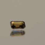 Brownish yellow octagon-shaped zoisite, 0.89 carat, 6.48 × 4.52 × 2.85 mm, treatment unknown, Tanzania origin, AIG certified (GEM20231025102540).