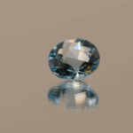 Blue round-shaped topaz, 3.7 carat, 9.5 × 9.5 × 6.0 mm, no treatment, unknown origin.