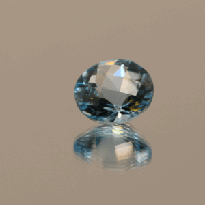 Blue round-shaped topaz, 3.7 carat, 9.5 × 9.5 × 6.0 mm, no treatment, unknown origin.