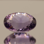 Natural oval cut amethyst gemstone with purple violet color, 19.30 × 15.00 mm