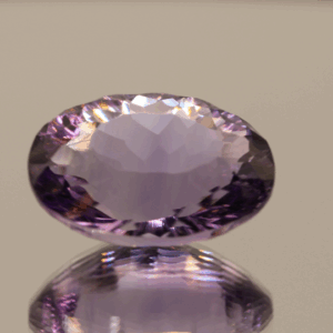 Natural oval cut amethyst gemstone with purple violet color, 19.30 × 15.00 mm