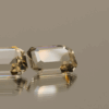 Pair of faceted Topaz gemstones, colorless, octagon cut, 7.7 carats total, high clarity, ideal for fine jewelry.