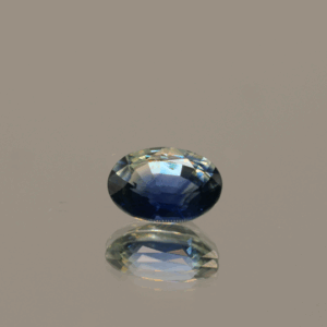 Natural sapphire gemstone, 0.93 carat, oval cut, cornflower blue color, heat-treated, loose gemstone, dimensions 6.81 × 5.09 × 3.20 mm, origin Madagascar, GFCO certified.