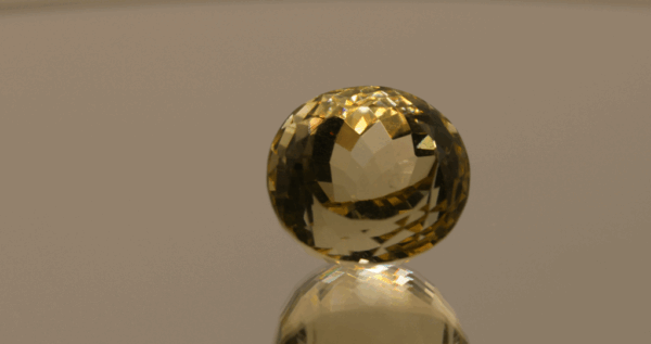 Lemon Quartz gemstone 16.3 carats, natural light yellow oval-cut, premium quality for jewelry