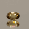 Brownish yellow oval-shaped zircon, 2.89 carat, 9.1 × 5.99 × 4.59 mm, untreated, unknown origin, IGI certified (M2H91448).