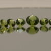 Natural peridot set totaling 21 carat, round cut, yellow green color, untreated, loose gemstones, dimensions 9.6 × 5.1 × 4.4–6.5 mm, perfect for fine jewelry.