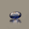 Natural sapphire gemstone, 0.72 carat, oval cut, blue color, heat-treated, loose gemstone, dimensions 6.62 × 4.7 × 2.64 mm, origin unknown, AIG certified.