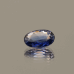 Natural sapphire gemstone, 0.72 carat, oval cut, blue color, heat-treated, loose gemstone, dimensions 6.62 × 4.7 × 2.64 mm, origin unknown, AIG certified.