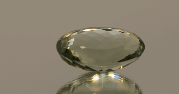 Natural prasiolite gemstone, 17.59 carat, oval cut, pale green color, untreated, loose gemstone, dimensions 21.8 × 13.5 × 9.4 mm, ideal for fine jewelry.