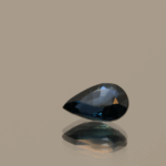 Royal blue pear-shaped sapphire, 0.73 carat, 6.87 × 4.8 × 2.92 mm, heat-treated, Madagascar origin, IGS certified.