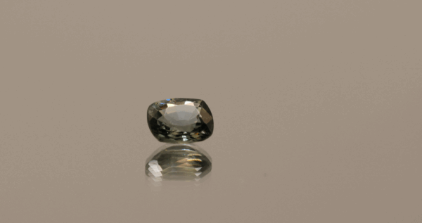Greenish grey cushion-shaped Burma spinel gemstone, 1.02 carat, 6.54 × 5.59 × 3.29 mm, no treatment, Burma origin, GFCO certified.