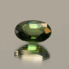 Oval vivid green sapphire 2.53 carat, heat-treated, Madagascar origin, dimensions 9.44 × 7.11 × 4.22 mm, AIG certified.