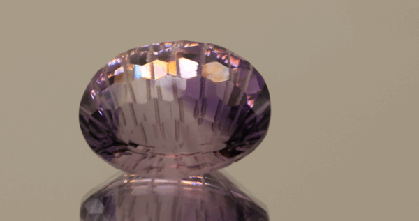 Natural oval cut amethyst gemstone with purple violet color, 17.20 × 14.10 mm