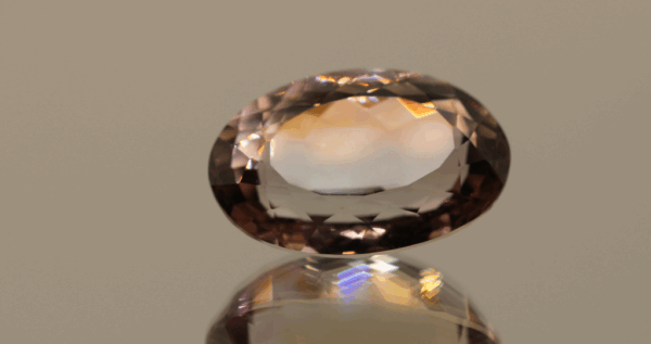 Natural oval cut ametrine gemstone with purple yellow color, 20.00 × 13.80 mm