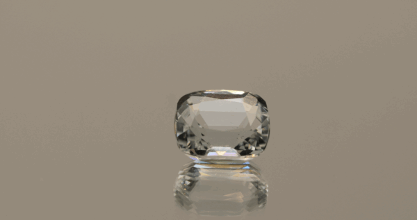 Natural cushion cut aquamarine gemstone with colorless hue, 10.50 × 9.00 mm
