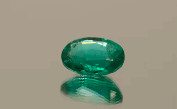 Natural emerald green gemstone 3.65 carats oval cut vivid green AA color moderate oil treatment certified loose stone