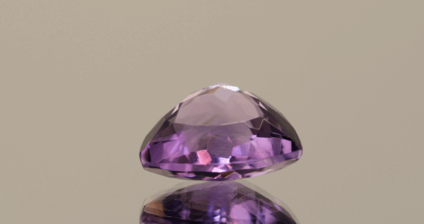 Natural trillion cut amethyst gemstone with purple violet color, 13.30 × 12.50 mm