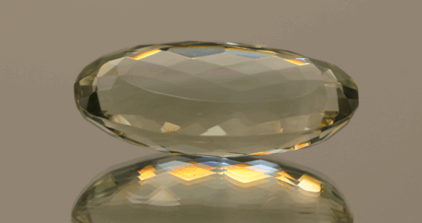 Natural prasiolite gemstone, 31.46 carat, oval cut, pale green color, untreated, loose gemstone, dimensions 29.9 × 14.8 × 9.9 mm, ideal for fine jewelry.