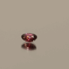 Natural ruby stone, 0.53 carat, oval cut, red color, unheated, loose gemstone, dimensions 5.28 × 4.31 × 2.31 mm, origin Mozambique, AIG certified.