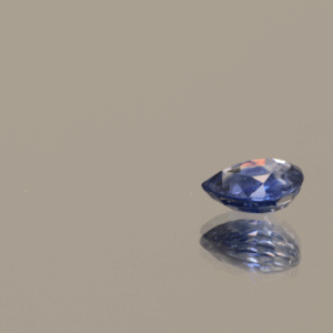 Blue pear-shaped sapphire, 0.62 carat, 5.44 × 5.18 × 2.46 mm, heat-treated, unknown origin, AIG certified.