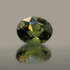 Natural unheated yellowish green Sapphire, oval cut 3.05 carat gemstone from Madagascar, certified by GFCO (AXP7535 31453-13)