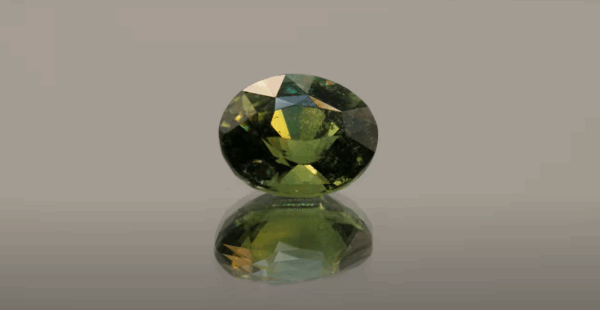 Natural unheated yellowish green Sapphire, oval cut 3.05 carat gemstone from Madagascar, certified by GFCO (AXP7535 31453-13)