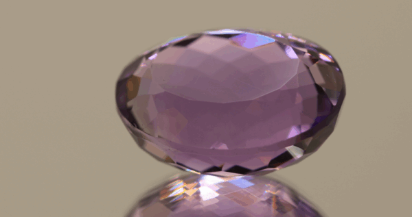 Natural oval cut amethyst gemstone with purple violet color, 20.50 × 16.00 mm