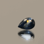 Blue pear-shaped sapphire, 0.92 carat, 6.99 × 5.10 × 3.43 mm, heat-treated, unknown origin, AIG certified.