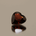 Natural spessartite garnet gemstone 3.7 carats heart cut orange red color untreated loose stone