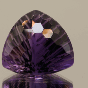 Natural trillion cut amethyst gemstone with purple violet color, 16.30 × 15.90 mm