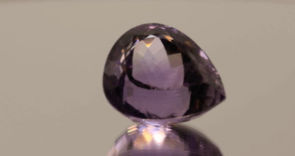 Natural pear cut amethyst gemstone with purple violet color, 20.46 × 17.18 mm