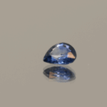 Blue pear-shaped sapphire, 0.62 carat, 5.70 × 5.31 × 2.44 mm, heat-treated, unknown origin, AIG certified.